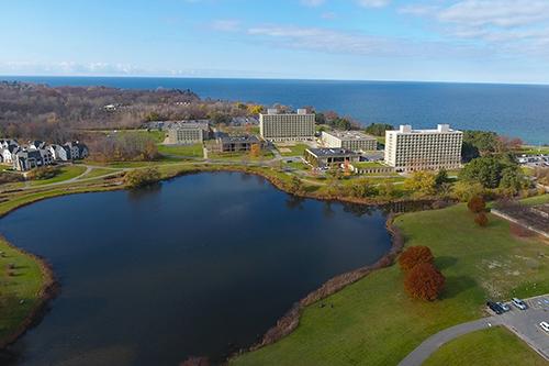 Aerial view of Oswego campus and Lake Ontario