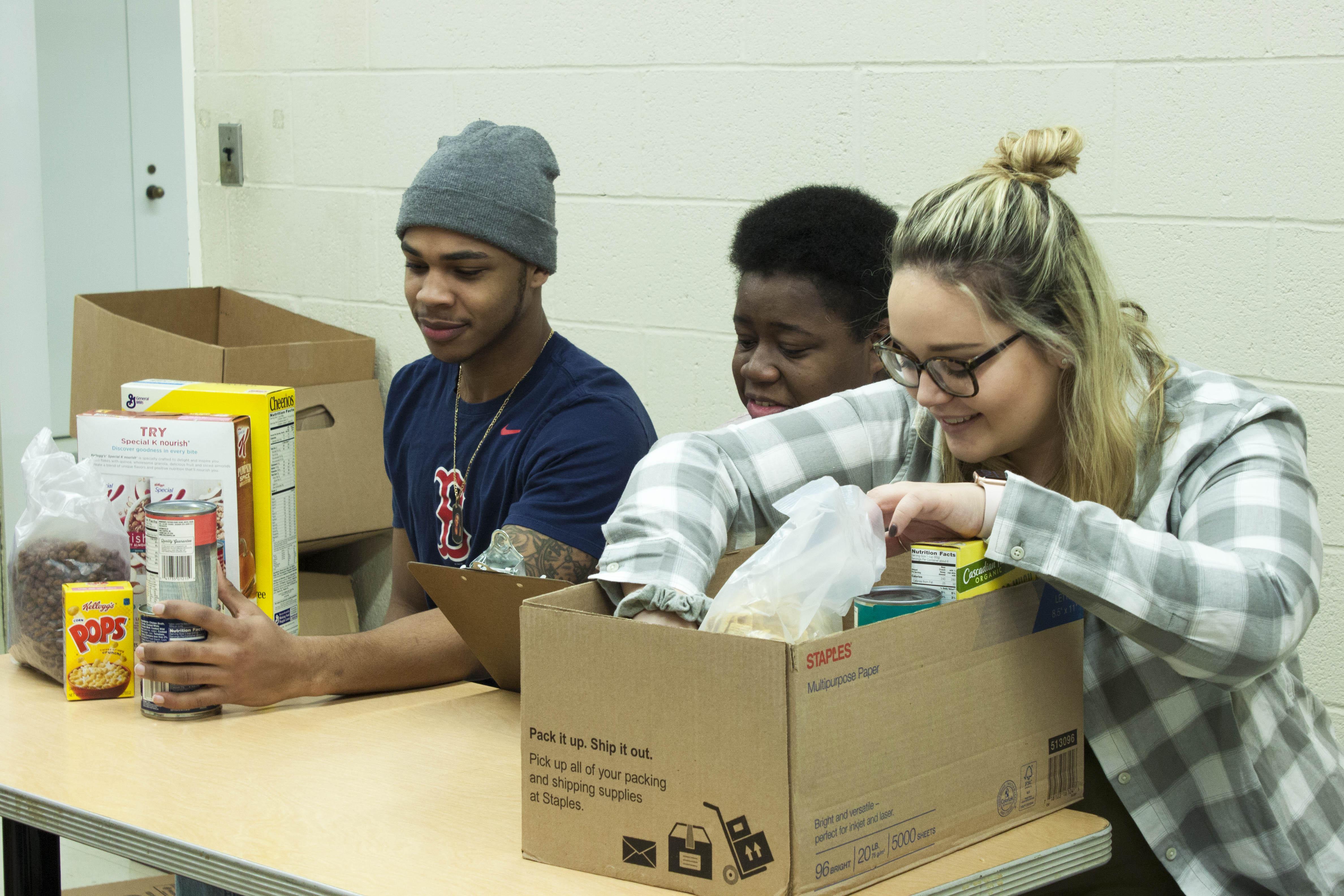 Volunteers sorting through donations