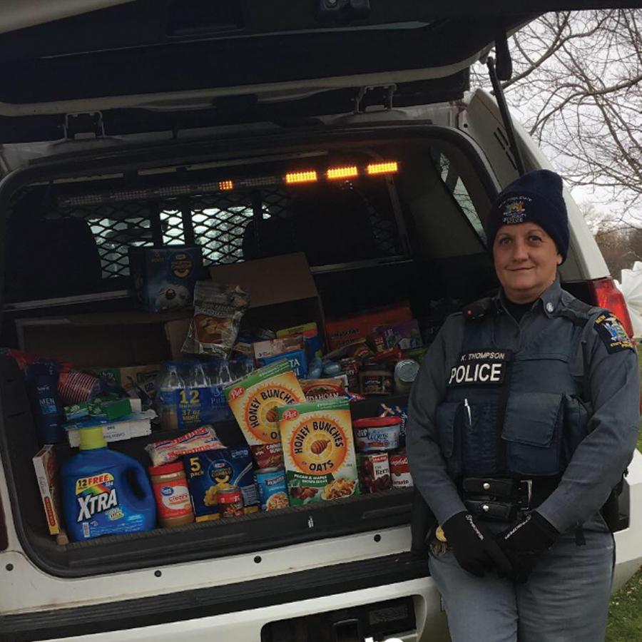University Police with donations in vehicle